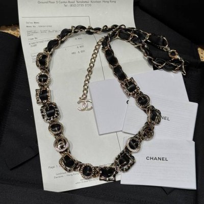 Chanel's new waist chain features classic Chanel black and gold, interwoven cha