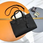 Sac De Jour Classic accordion bag with ball pattern, baby size black, 26cm. Also