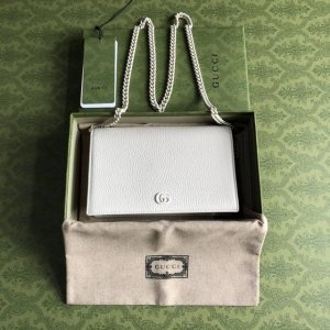 Top-of-the-line version with a green box featuring G's new small Double G metal