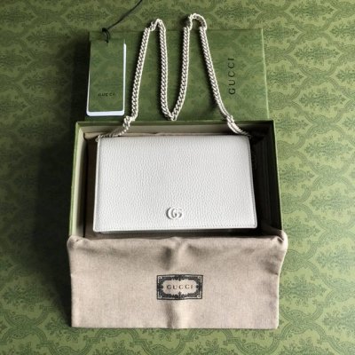 Top-of-the-line version with a green box featuring G's new small Double G metal