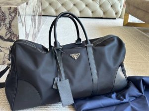Unboxed Size: 55*25cm Versatile and durable Prada black travel bag Looks great o