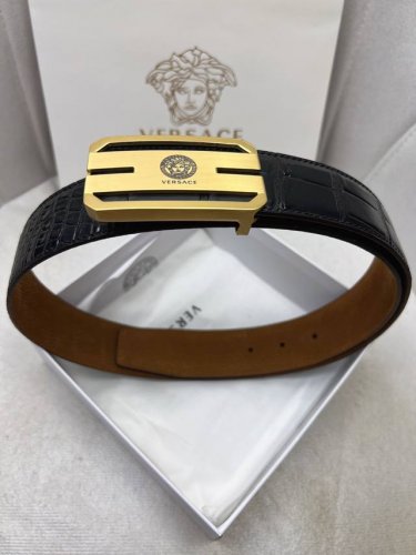 Versace. Original top-grain cowhide crocodile-grain leather upper; top-grain cow