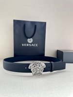 Versace: This Versace leather belt, of original quality, features a hollowed-ou