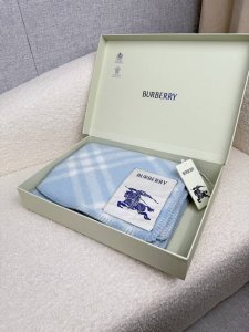 B Brand. A sophisticated and elegant milky blue scarf exuding understated luxury