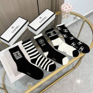 A box of five pairs of Chanel high-quality, super popular trending socks, featur