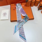 Hermes "Kaleidoscope Effect" Twilly small silk scarf. Twilly silk ribbon 100% m