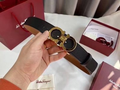 Gift This stylish double-sided belt from Salvatore Ferragamo features a two-tone