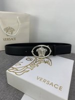 VERSACE This soft first-grain leather belt features an oval Medusa buckle. A met
