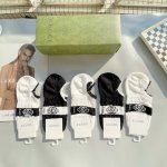 A box of five Gucci socks with packaging