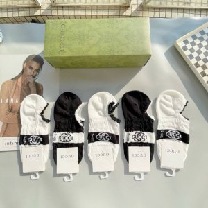A box of five Gucci socks with packaging