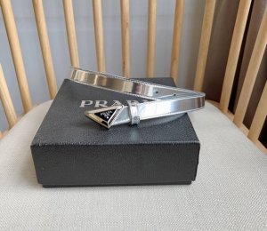 prada The Latest Model From Prada Counters This Shiny Patent Leather Belt Is