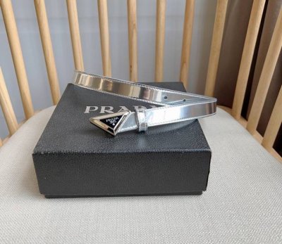 prada The Latest Model From Prada Counters This Shiny Patent Leather Belt Is