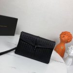 , the Bv casual clutch with a matching box, is made of imported waxed cowhide. I