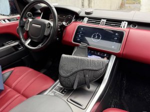 A new high-end Dior shoulder bag. This messenger bag features a magnetic flap cl