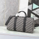 Dior Oblique Duffle Bag 9053 The Dior Oblique jacquard duffle bag is a stylish,