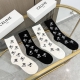 A box of four Celine high-quality, super popular straight-leg socks, featuring C