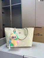 with Labubu pendant Coach shopping bag Whether it is a long trip or a short out