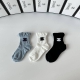 Specially packaged Chanel new style slouch socks! Three pairs per box, same styl