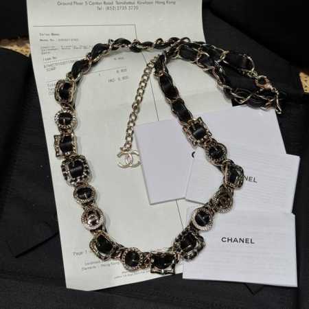 Chanel's new waist chain features classic Chanel black and gold, interwoven cha - Click Image to Close