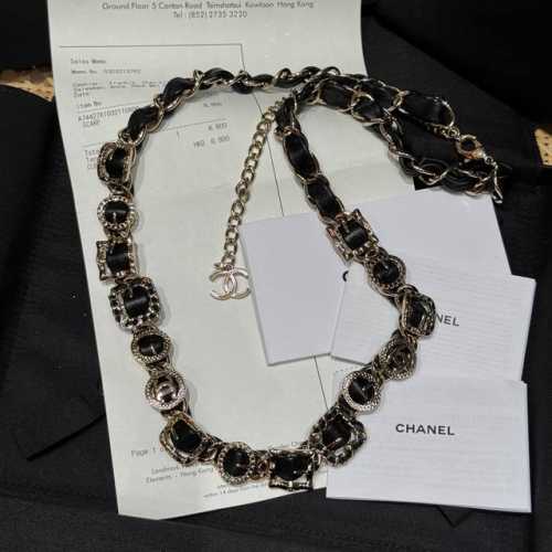 Chanel's new waist chain features classic Chanel black and gold, interwoven cha