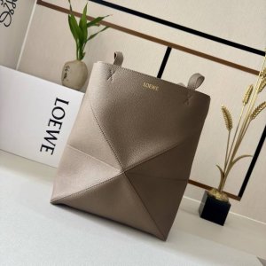 Lw The new small soft grain cowhide Puzzle Fold Tote features a lightweight, geo