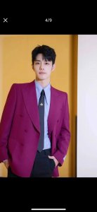 silk tie with golden bee embroidery, a motif that has quickly become one of the