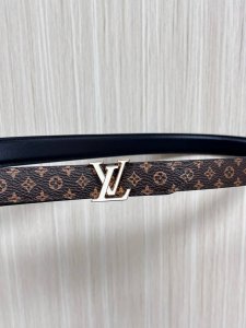 2.0 wide canvas with white floral print, black calfskin with a raised, pointed,