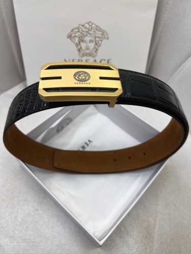 Versace. Original top-grain cowhide crocodile-grain leather upper; top-grain cow