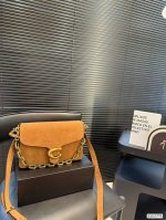 with box Coach underarm Coach is back to make things happen Cool, sassy and pra