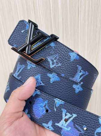 This reversible belt captures a painter's creative moment with a watercolor eff - Click Image to Close