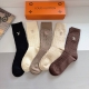 A box of 5 pairs of Louis Vuitton high-end embroidered cashmere knee-high socks,