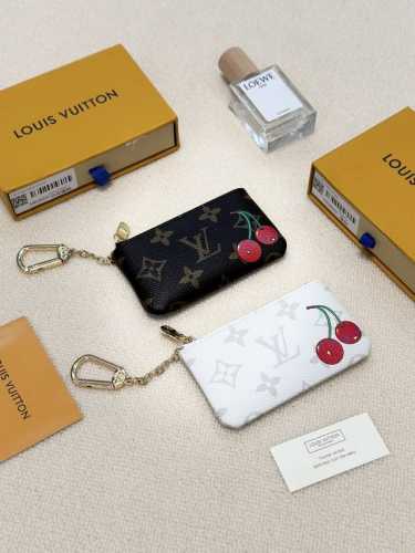 Color: Old Cherry White Cherry Size: 11x7 This small Damier canvas bag is perfe