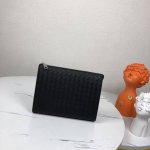 This new woven vertical clutch features a classic Bv weave design, offering a s