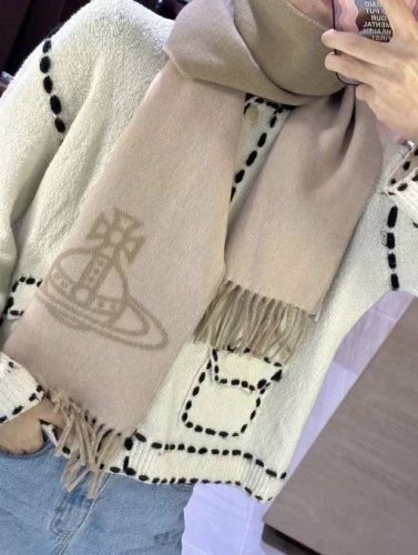 Vivienne Westwood. The Saturn logo, a favorite of British punk icon Vivienne Wes