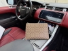 High-end new "Coach" clutch. Coach men's clutch featuring classic monogram prin
