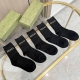 Five pairs of Gucci high-quality socks in one box, all with packaging. These Gu