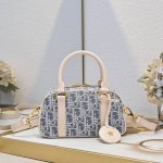 New arrival, Dior's premium original D-Vibe small bowling bag. This casual, spo