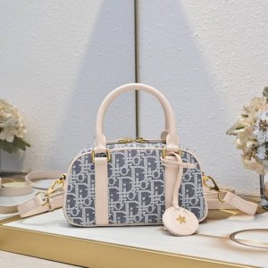 New arrival, Dior's premium original D-Vibe small bowling bag. This casual, spo