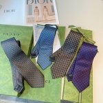 The Decorative Pattern Of This Silk Tie Is Composed Of Geometric Rhombuses And T