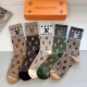 5 pairs of Louis Vuitton super popular knee-high socks (with packaging), a must