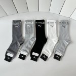 Special packaging for Puma's new mid-length slouch socks! Five pairs per box, sa