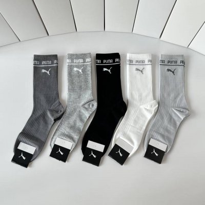 Special packaging for Puma's new mid-length slouch socks! Five pairs per box, sa