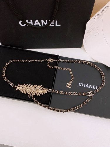 Chanel chain belt in metal, calfskin and rhinestones, gold, black and crystal br