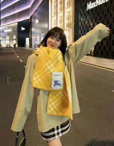 Understated luxury, exquisite femininity, and a stylish, elite-level scarf. This