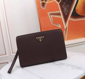 The latest and hottest Prada stainless steel combination lock clutch is shipping