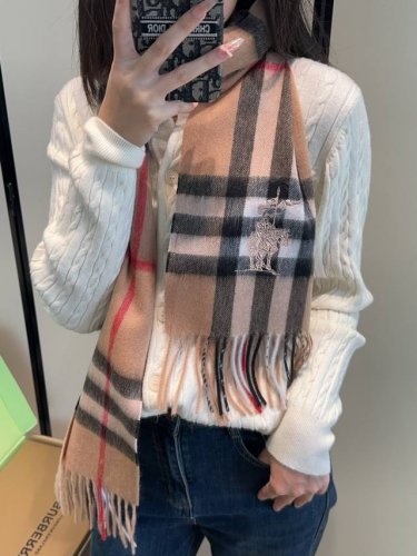 This Burberry scarf is absolutely gorgeous! It's so stylish and charming, a very