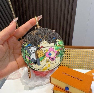 Louis Vuitton monogram bag pendant, cartoon painted small coin purse. Lv bag pen