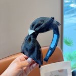 with packagingPrada's new trendy polka dot angled headband. A must-have for a g