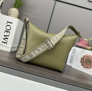 Low New Small Soft Smooth Cowhide and Jacquard Crossbody Bag This spacious and s