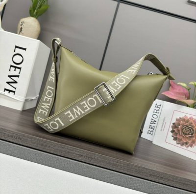 Low New Small Soft Smooth Cowhide and Jacquard Crossbody Bag This spacious and s